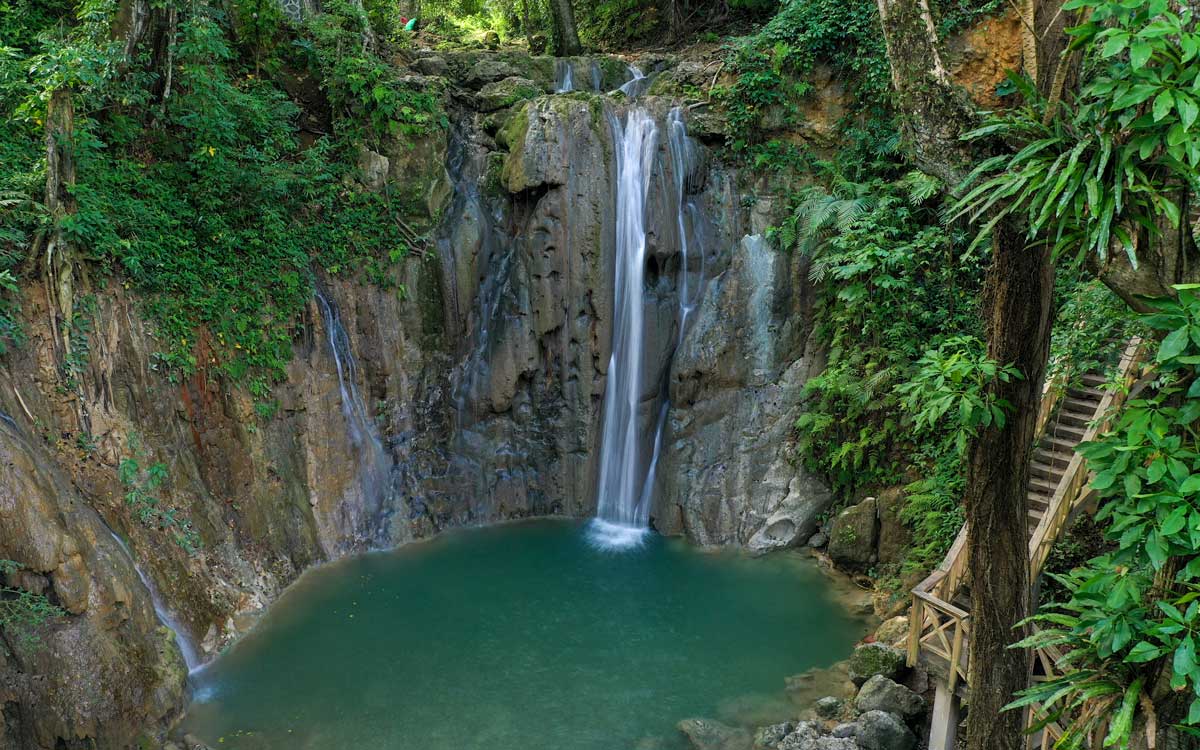 Waterfall with natural pool at bottom.